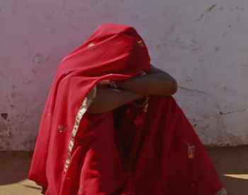 Krishna breaks down after her husband Gopal came home drunk in a village near Baran
