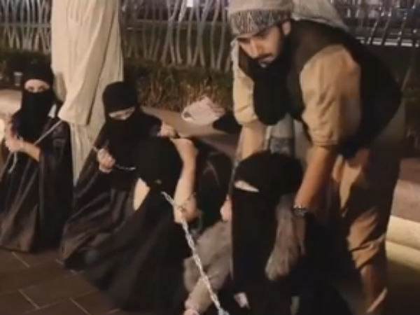 16-1413439889-isis-sex-slave-market2456-07