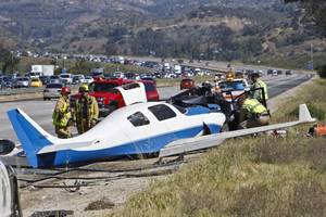 877-Small-Plane-Crashes-on-California-Freeway-Hits-Car
