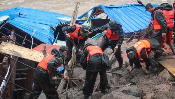 201605101012338258_Death-toll-mounts-to-34-in-Chinas-landslide_SECVPF