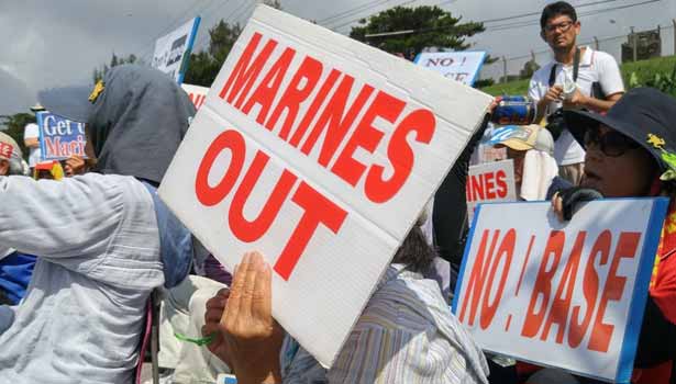 201606191226028881_Thousands-protest-US-bases-on-Okinawa-after-Japan-womans_SECVPF