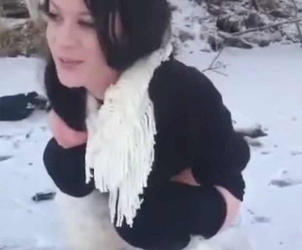 A-woman-urinates-on-a-Koran-833033