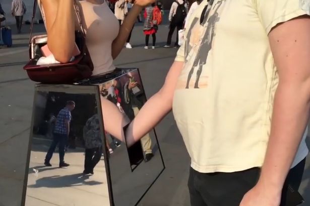 Performance-artist-arrested-for-letting-people-fondle-her